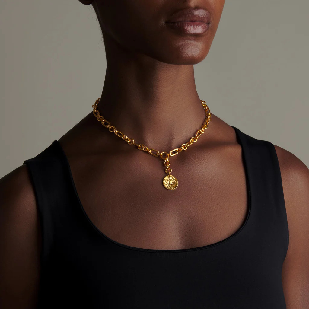 Gold chain pendant on model